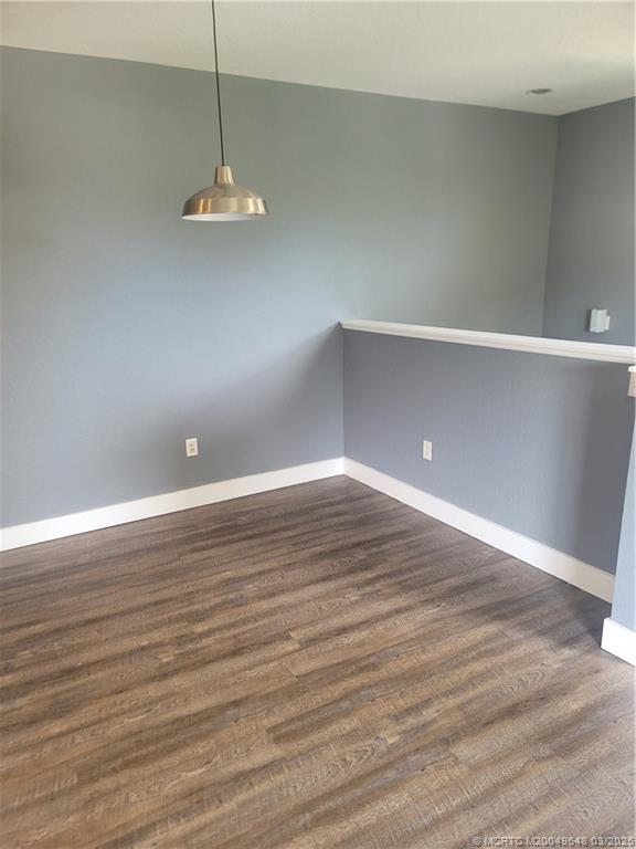 59 Southeast Palermo, Unit 204 Stuart, FL 34994 - Photo 19 of 23 a view of empty room with wooden floor