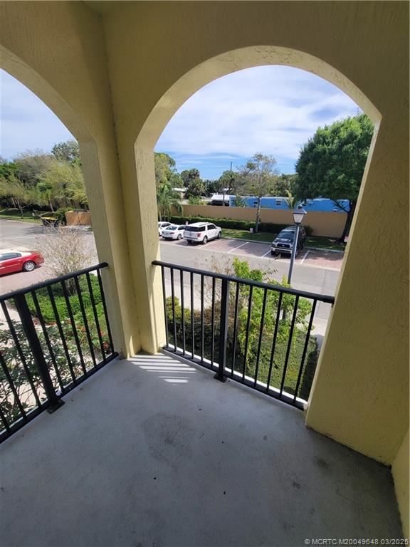 59 Southeast Palermo, Unit 204 Stuart, FL 34994 - Photo 20 of 23 a view of balcony with furniture