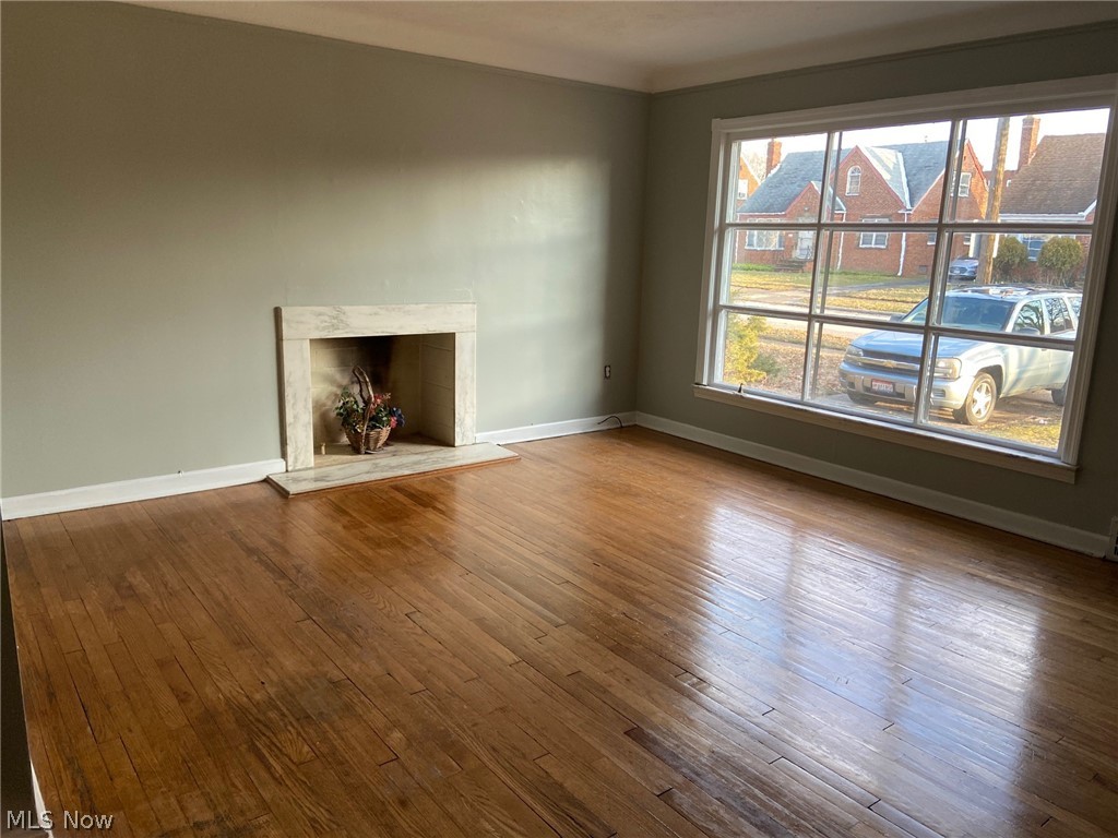 3827 Colony Road South Euclid, OH 44118 - Photo 3 of 29 Spacious living room with hardwood floor and plenty of natural light