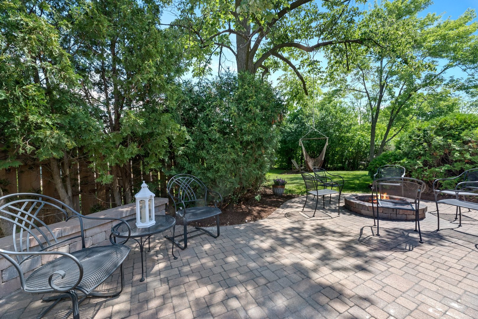 623 Ranch Road Wheaton, IL 60187 - Photo 20 of 21 a view of a chairs and table in a backyard