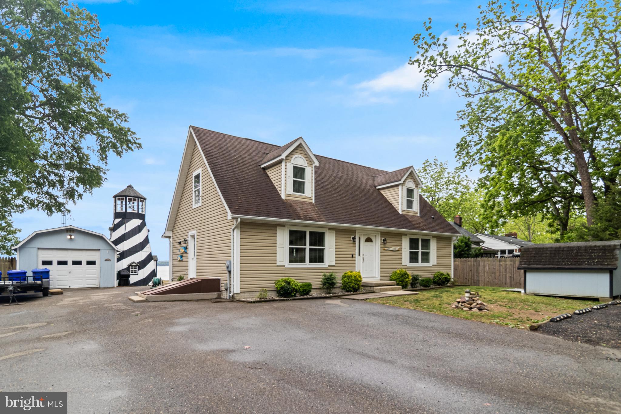 12015 Woodbury Road Nanjemoy, MD 20662 - Photo 9 of 53 a view of a white house with a street