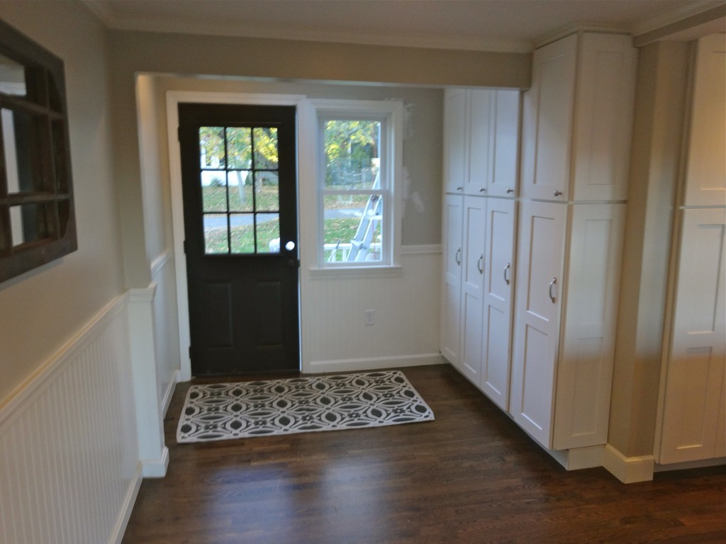 9 Summit Drive Hingham, MA 02043 - Photo 11 of 28 a view of an empty room with wooden floor and a window