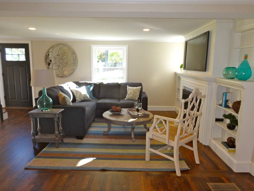 9 Summit Drive Hingham, MA 02043 - Photo 13 of 28 a living room with furniture a flat screen tv and a window