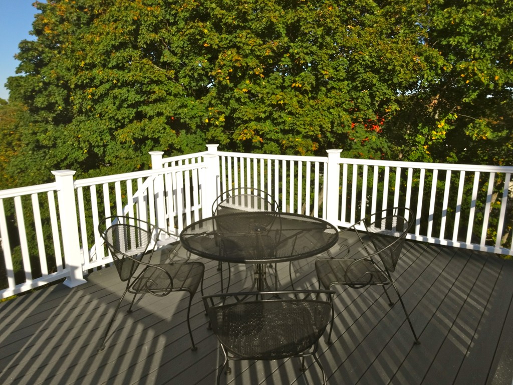 9 Summit Drive Hingham, MA 02043 - Photo 24 of 28 a balcony with a bench