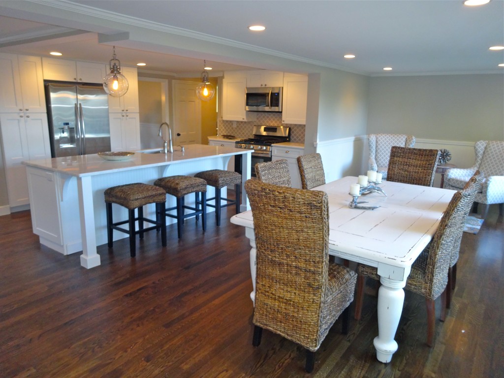 9 Summit Drive Hingham, MA 02043 - Photo 4 of 28 a large kitchen with a table and chairs
