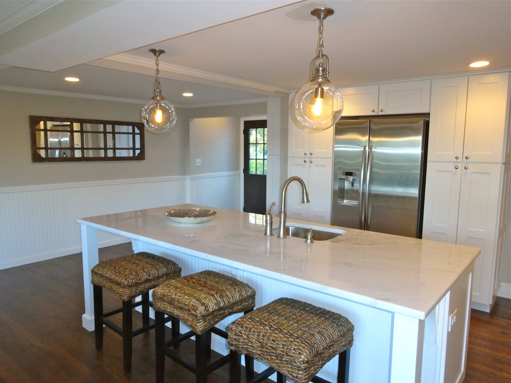 9 Summit Drive Hingham, MA 02043 - Photo 7 of 28 a dining room filled chandelier and wooden floor