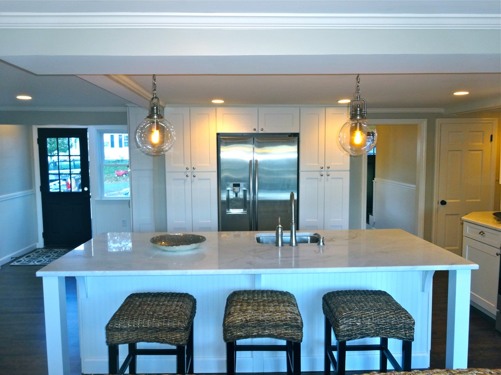 9 Summit Drive Hingham, MA 02043 - Photo 8 of 28 a dining table with chairs and mirror