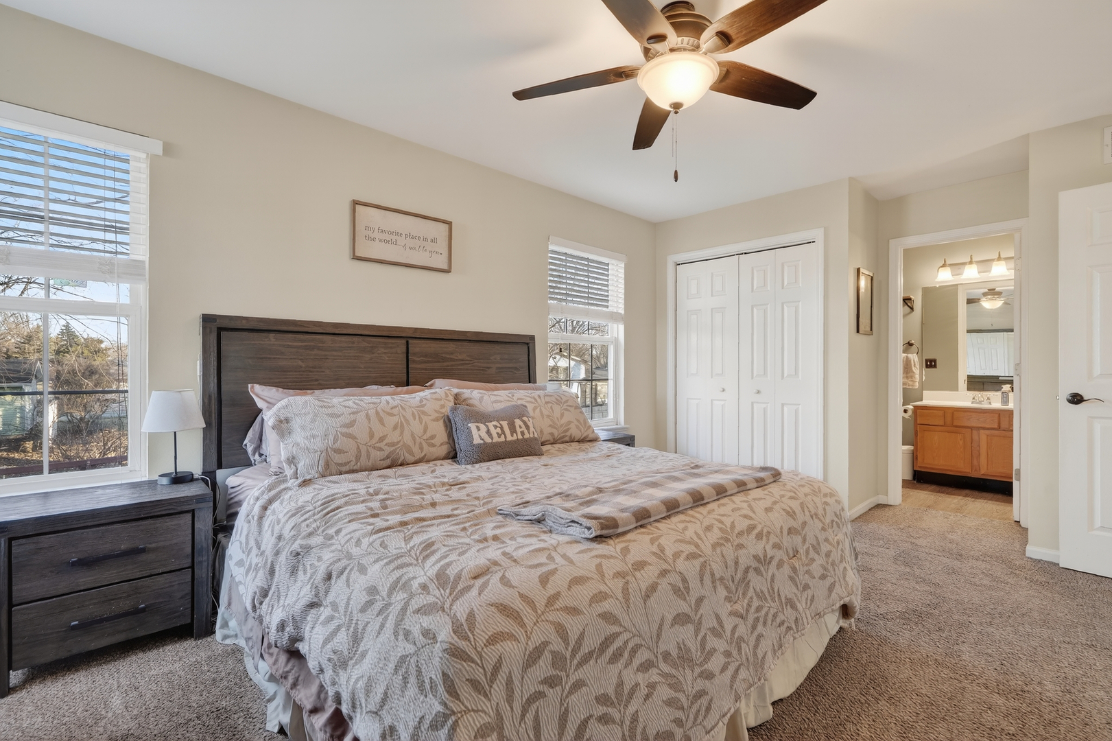 771 Eletson Drive Crystal Lake, IL 60014 - Photo 16 of 32 a bedroom with a bed and a large window