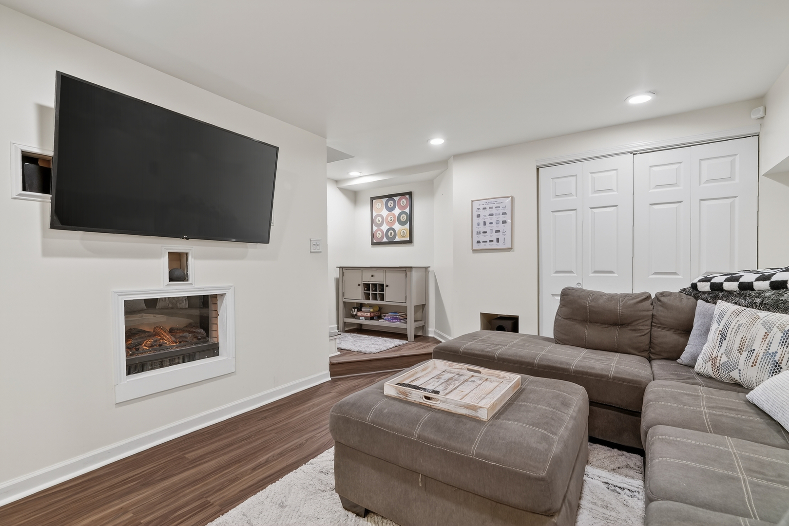 771 Eletson Drive Crystal Lake, IL 60014 - Photo 22 of 32 a living room with furniture and a flat screen tv