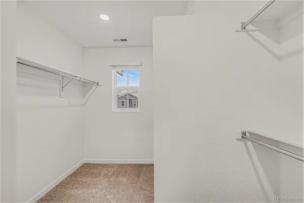 a view of small space with racks on the wall
