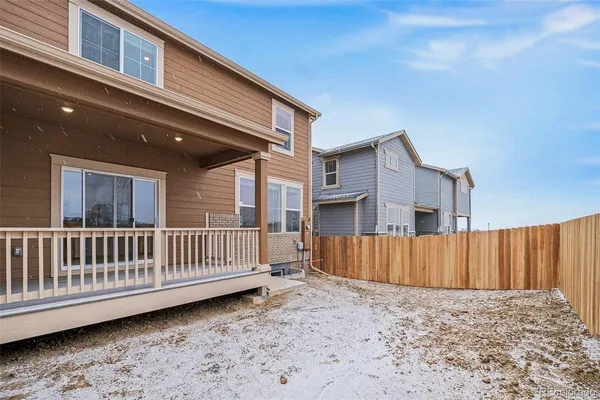 a view of outdoor space with wooden deck