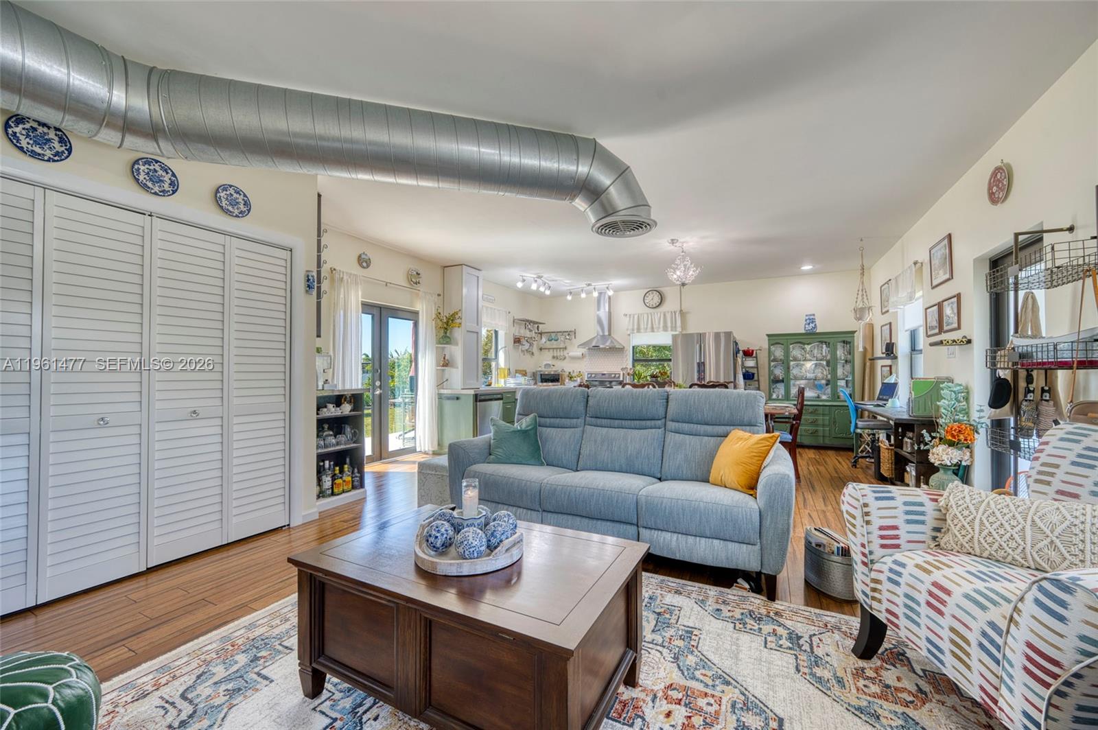 18860 Southwest 354th Terrace Homestead, FL 33034 - Photo 14 of 54 a living room with furniture and wooden floor