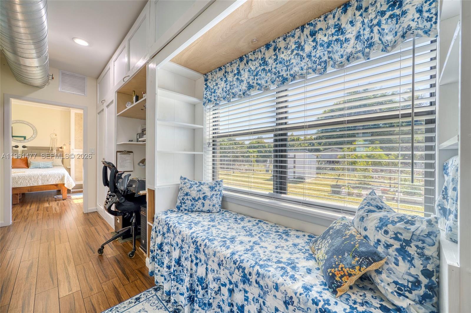 18860 Southwest 354th Terrace Homestead, FL 33034 - Photo 23 of 54 a living room with furniture and a large window