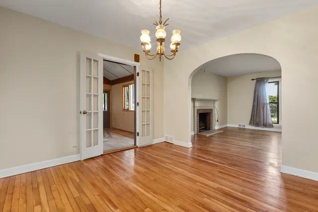 a view of a livingroom with wooden floor