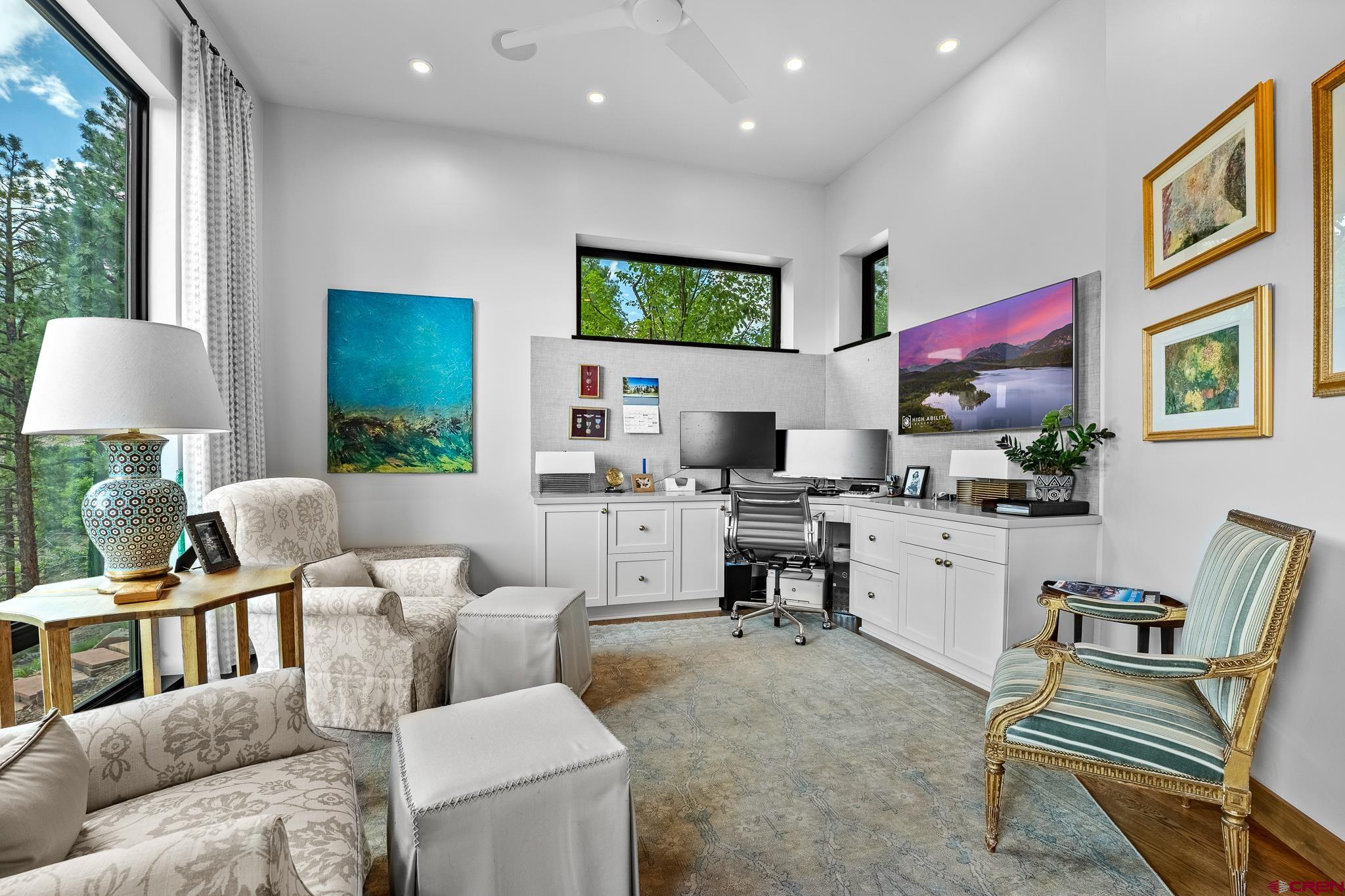 220 Hideout Trail Durango, CO 81301 - Photo 20 of 35 a living room with furniture and a flat screen tv