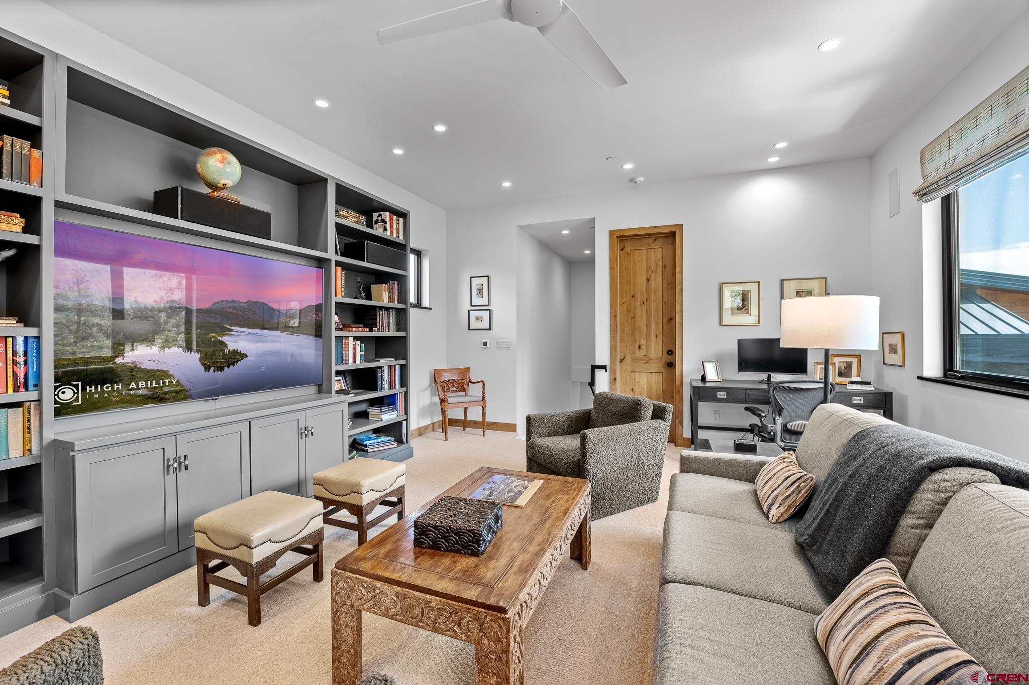 220 Hideout Trail Durango, CO 81301 - Photo 28 of 35 a living room with furniture and kitchen view