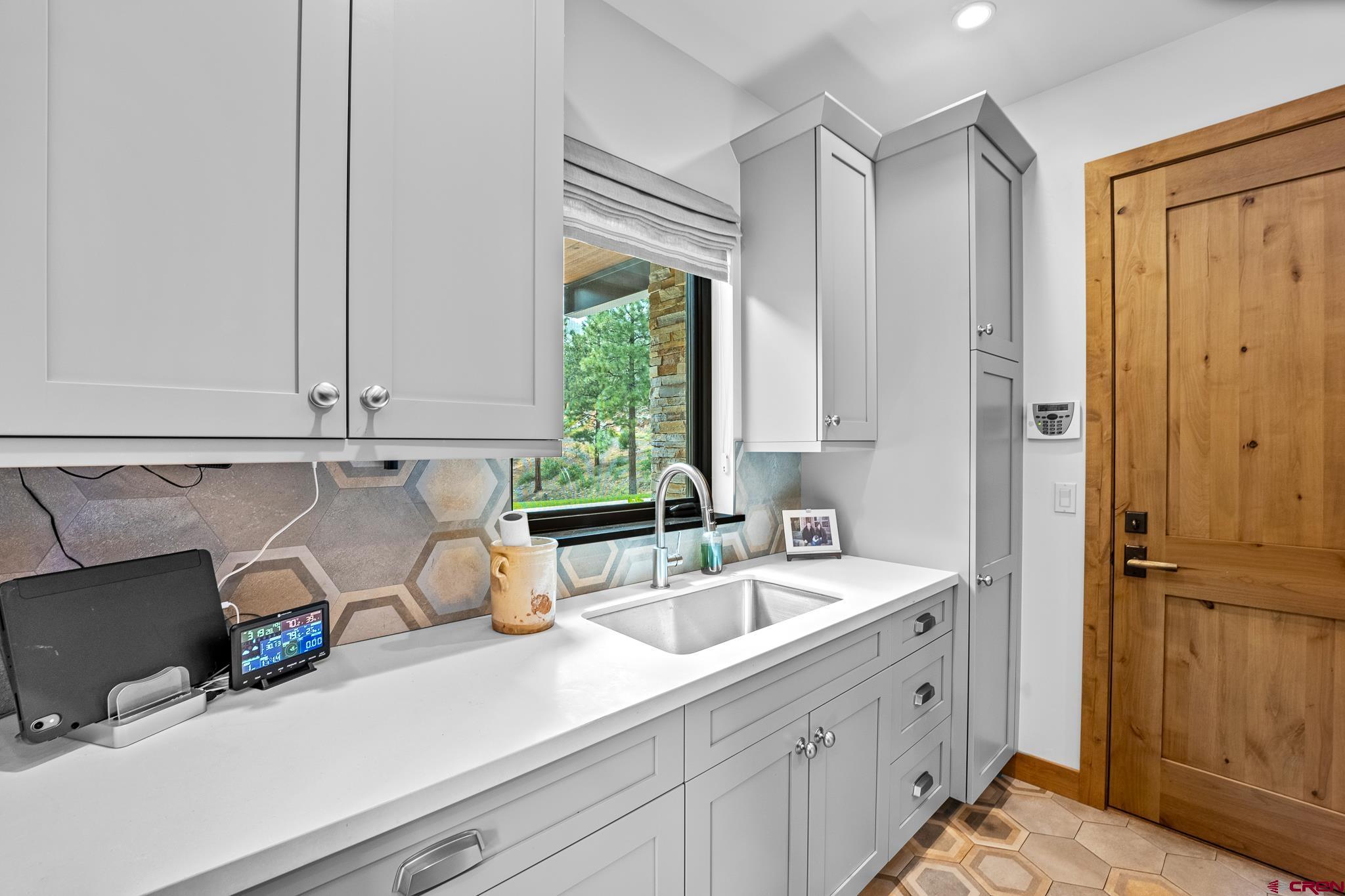 220 Hideout Trail Durango, CO 81301 - Photo 34 of 35 a kitchen with a sink and a window