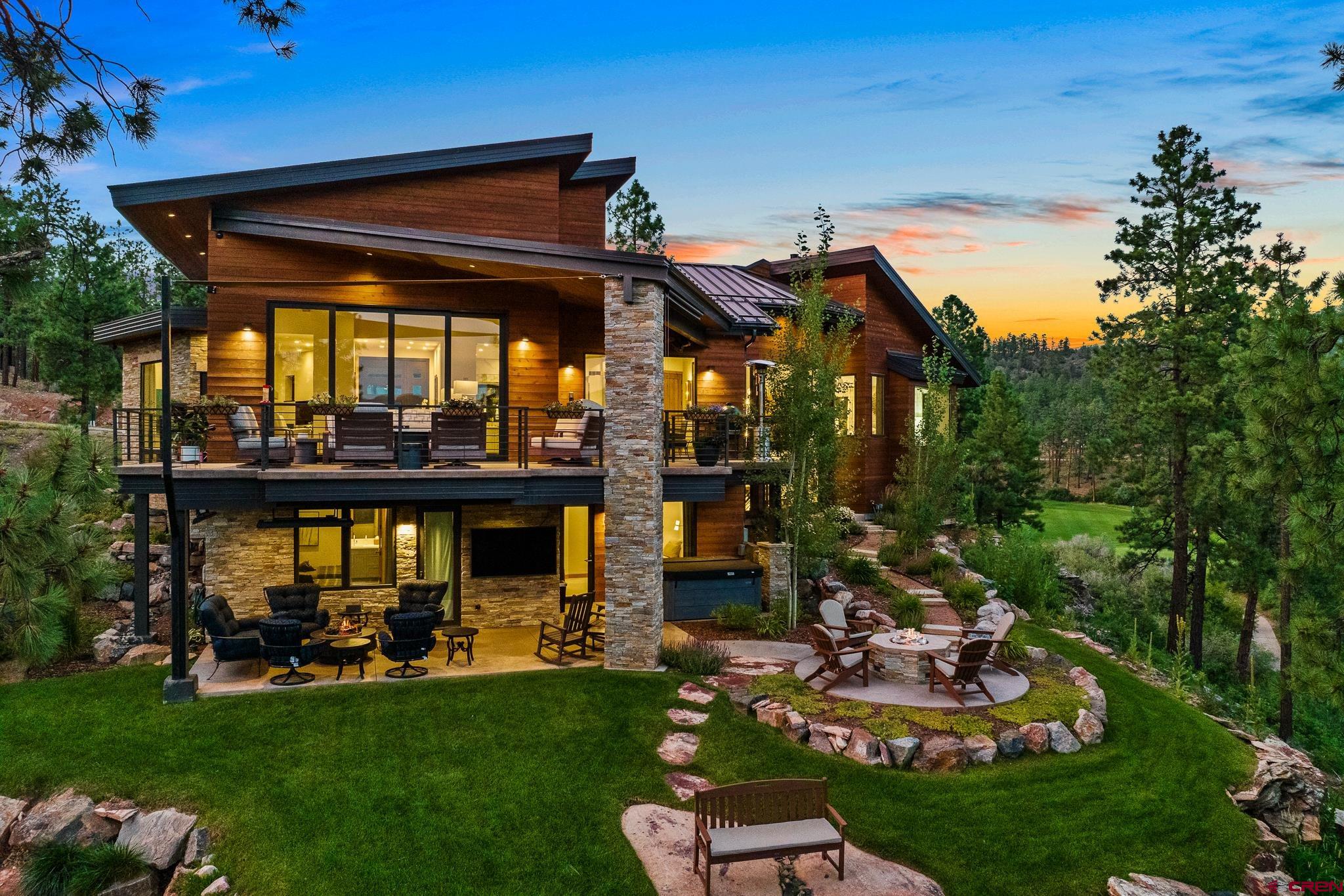 220 Hideout Trail Durango, CO 81301 - Photo 4 of 35 a view of a chairs and table in a yard