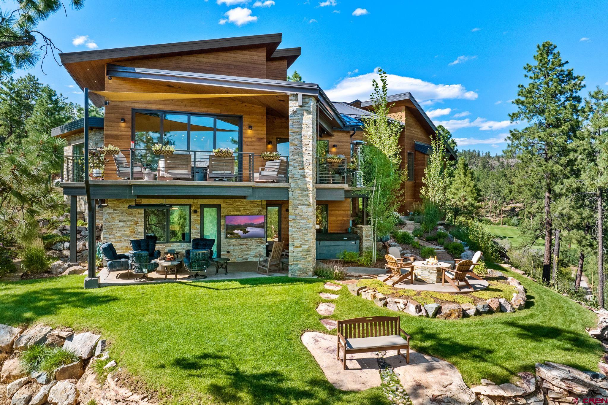 220 Hideout Trail Durango, CO 81301 - Photo 9 of 35 a view of a water fountain in front of the house