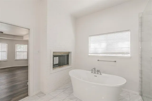 a bathroom with a sink and a bathtub