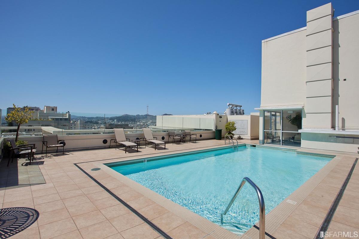 2200 Pacific Avenue, Unit 3A San Francisco, CA 94115 - Photo 49 of 57 a swimming pool with outdoor seating and yard
