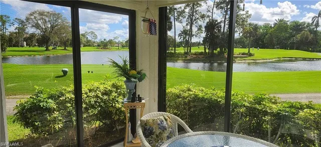 a view of a back yard from a balcony