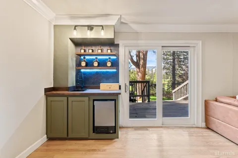 a view of living room with furniture and window