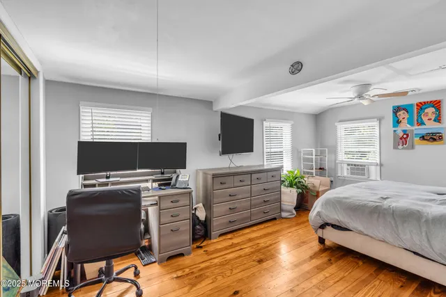 a bedroom with a bed and furniture