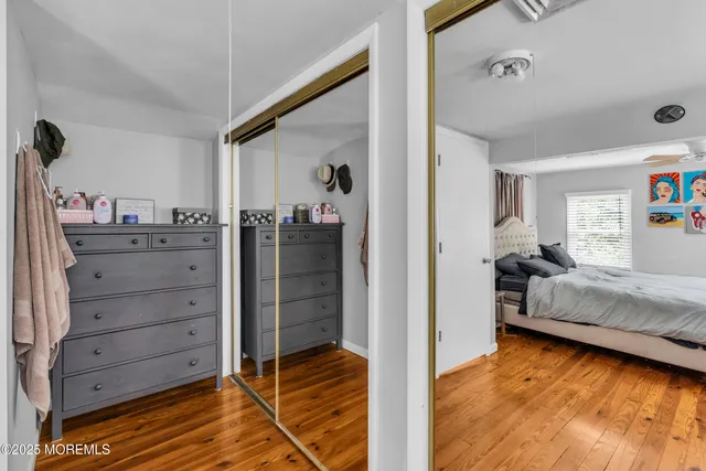 a bedroom with a bed and furniture