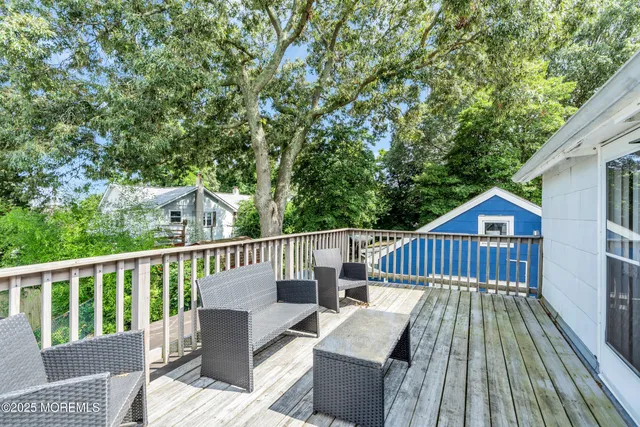 a view of balcony with furniture
