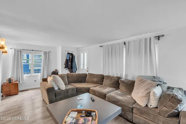 a living room with furniture and a couch