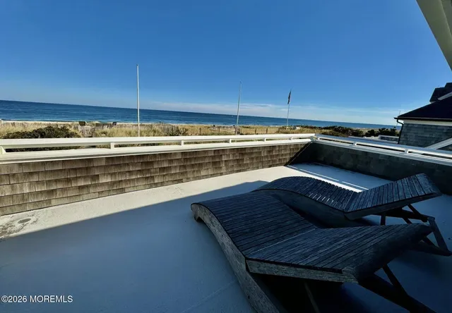 a view of a kitchen with a large stove and a chair