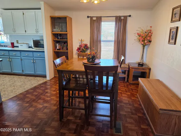 a bed room with furniture and a window
