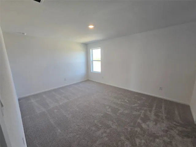 an aerial view of a house with a ocean view