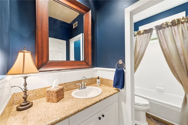 a room with furniture cabinets and window