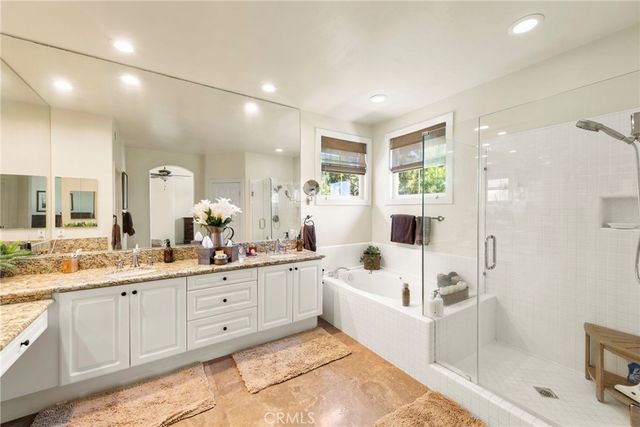 a bedroom with a bed and furniture