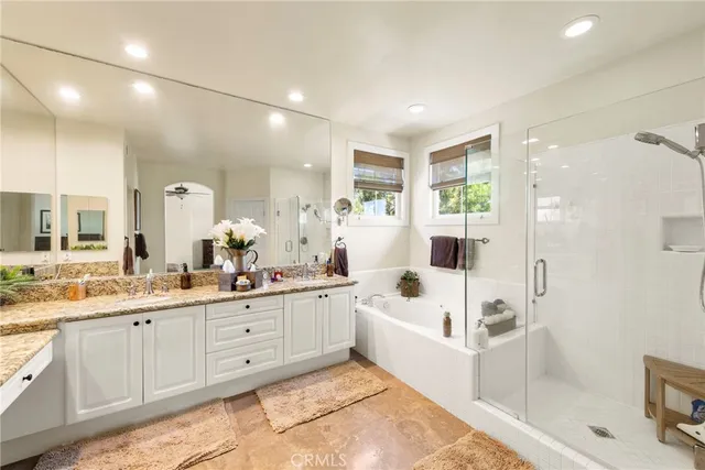 a bedroom with a bed and furniture