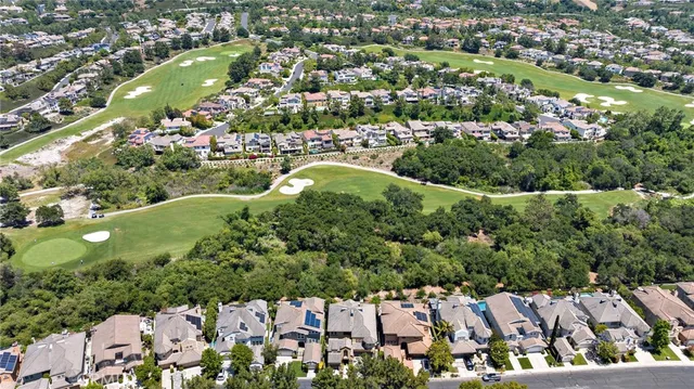 a living room with fireplace furniture and a flat screen tv