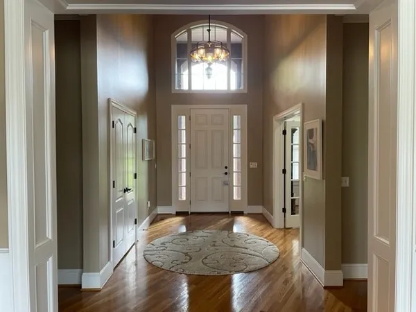 a living room with furniture fireplace and flat screen tv
