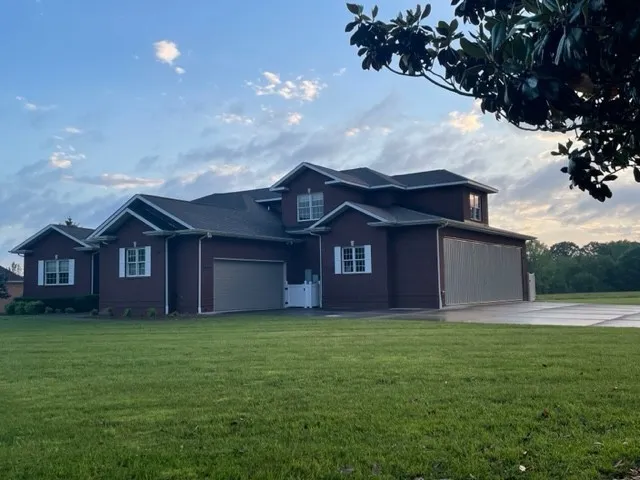 a house view with a garden space