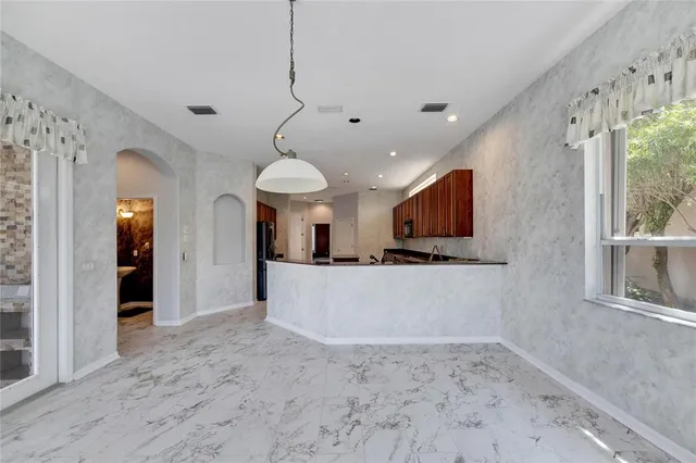 $8,000 | 17904 Cachet Isle Drive, Tampa, FL 33647