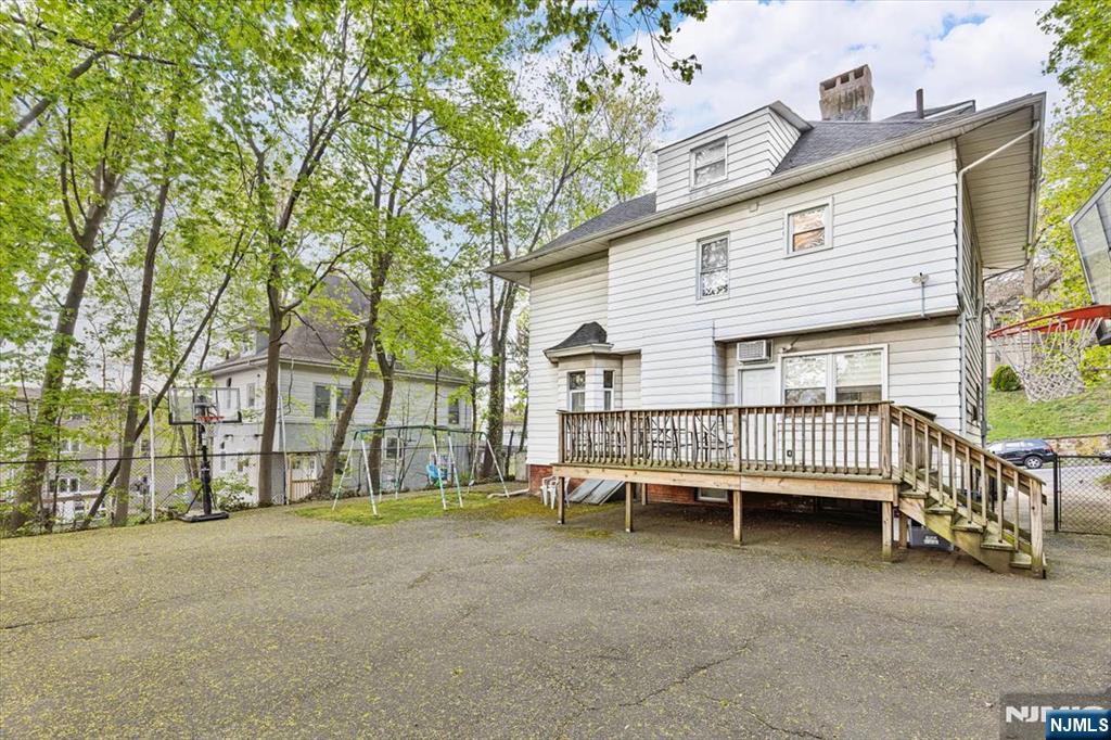 116 Westervelt Place Passaic, NJ 07055 - Photo 24 of 25 a view of a house with a backyard and chairs