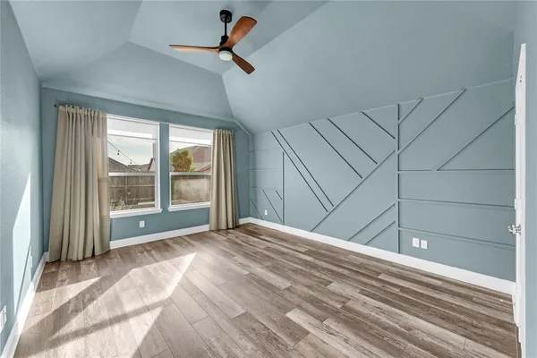 a view of a livingroom with a dishwasher and a window