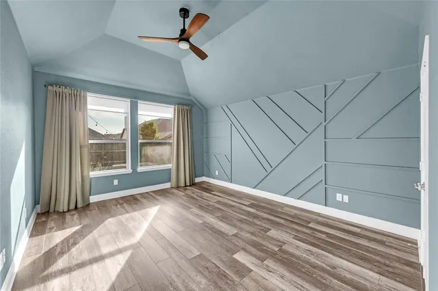 a view of a livingroom with a dishwasher and a window