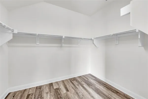 a view of an empty walk in closet