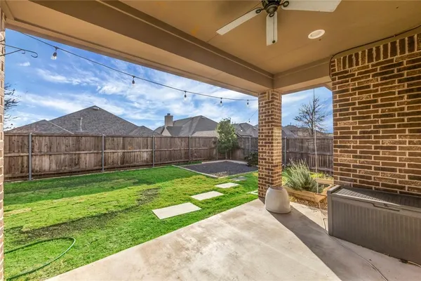 a view of a porch with a backyard