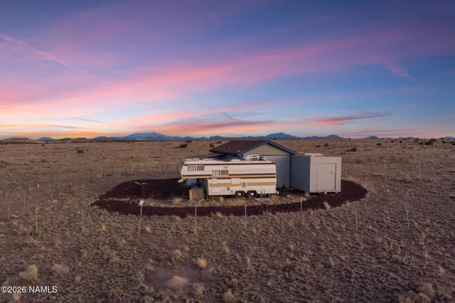 a view of a houses with sky view