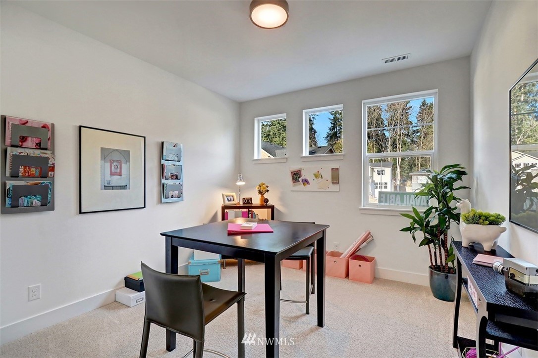 102 232nd Place Southeast, Unit 13 Bothell, WA 98021 - Photo 19 of 26 a view of a dining room with furniture and window