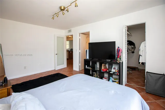 a view of balcony with furniture