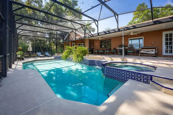 a view of a swimming pool with a porch